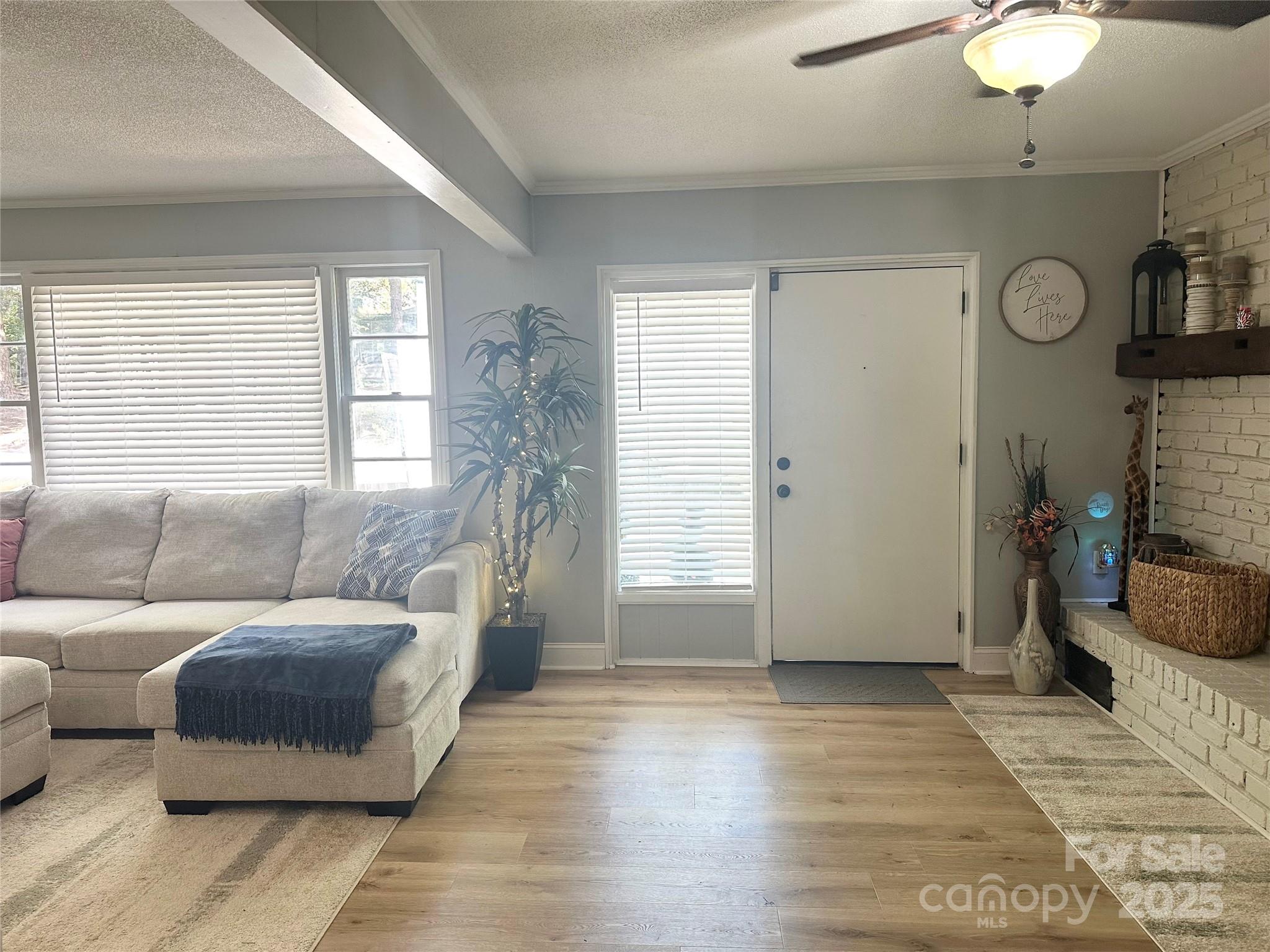 400 Charles Street Spencer, NC 28159 - Photo 16 of 26 a living room with furniture and a large window
