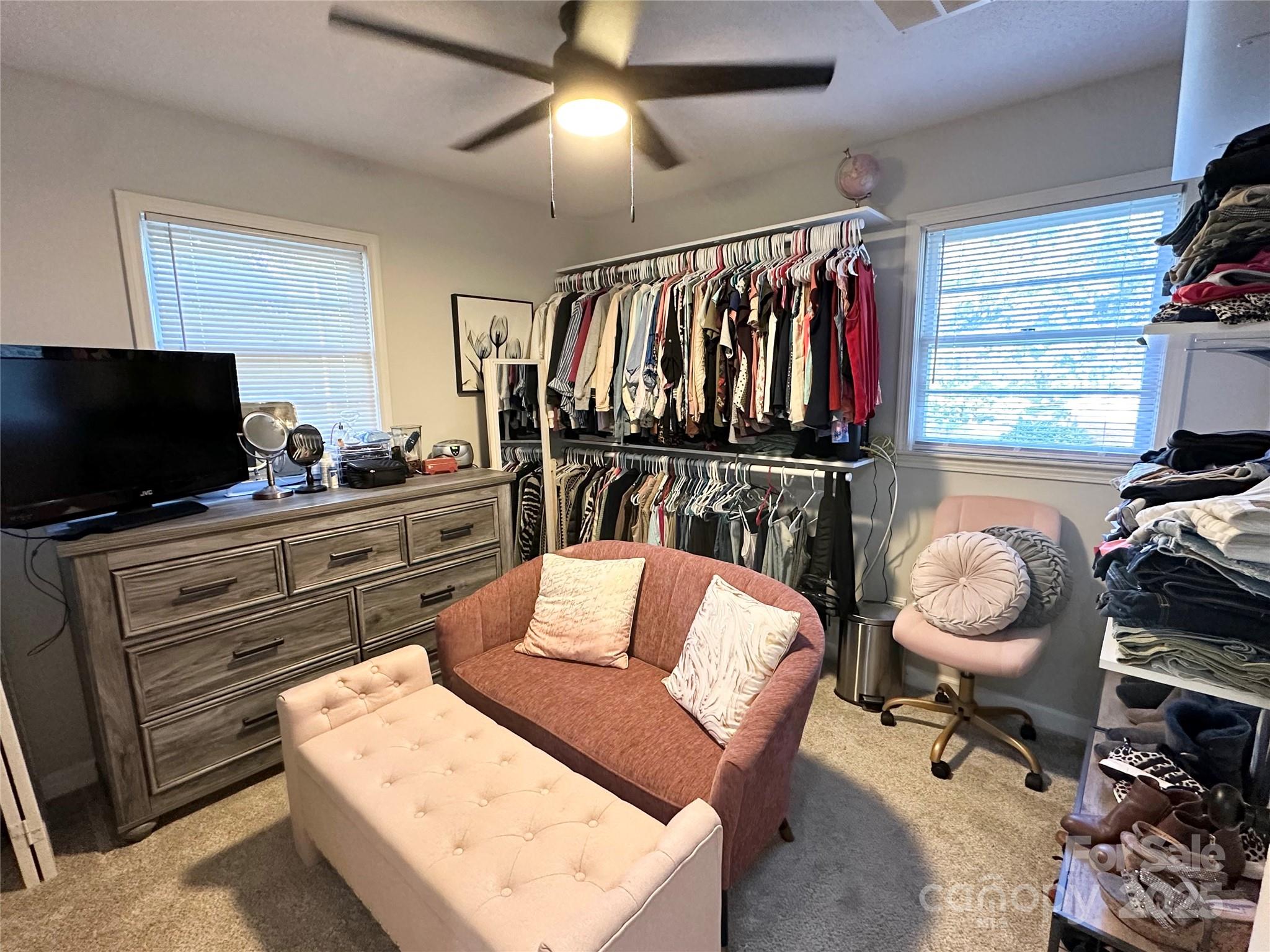 400 Charles Street Spencer, NC 28159 - Photo 19 of 26 a living room with furniture and a flat screen tv