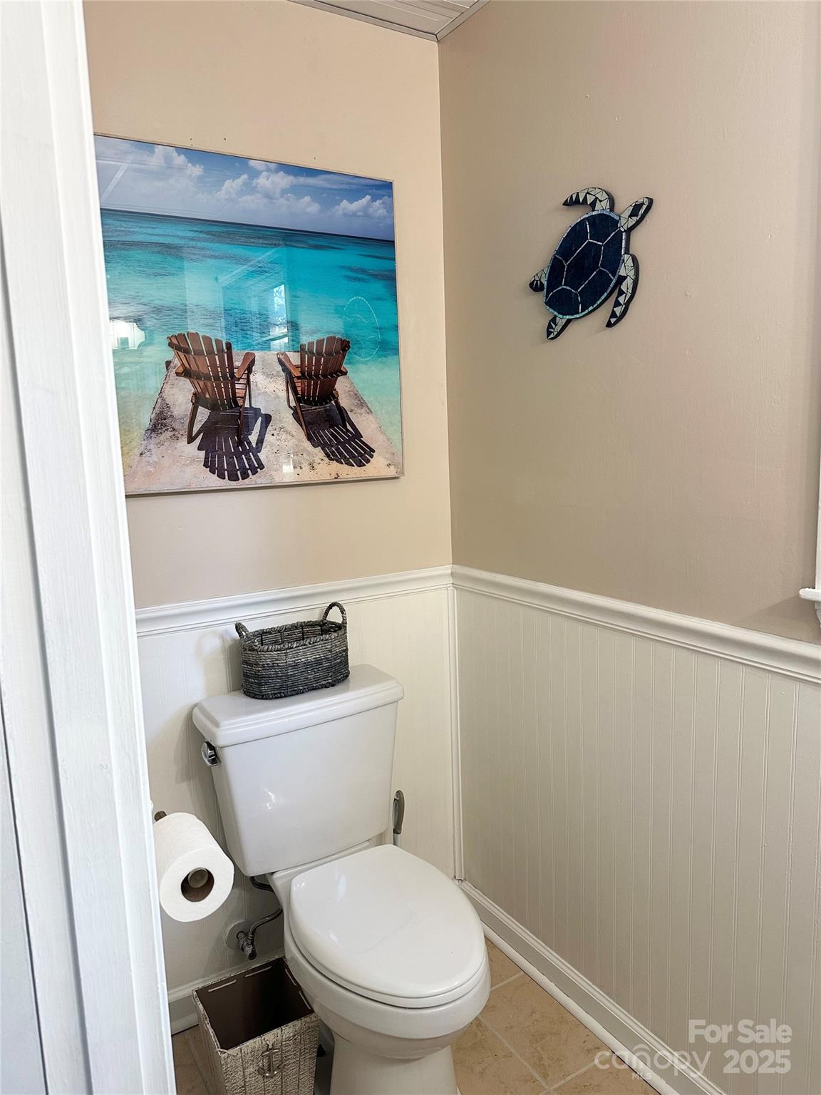 400 Charles Street Spencer, NC 28159 - Photo 23 of 26 a bathroom with a toilet and a mirror