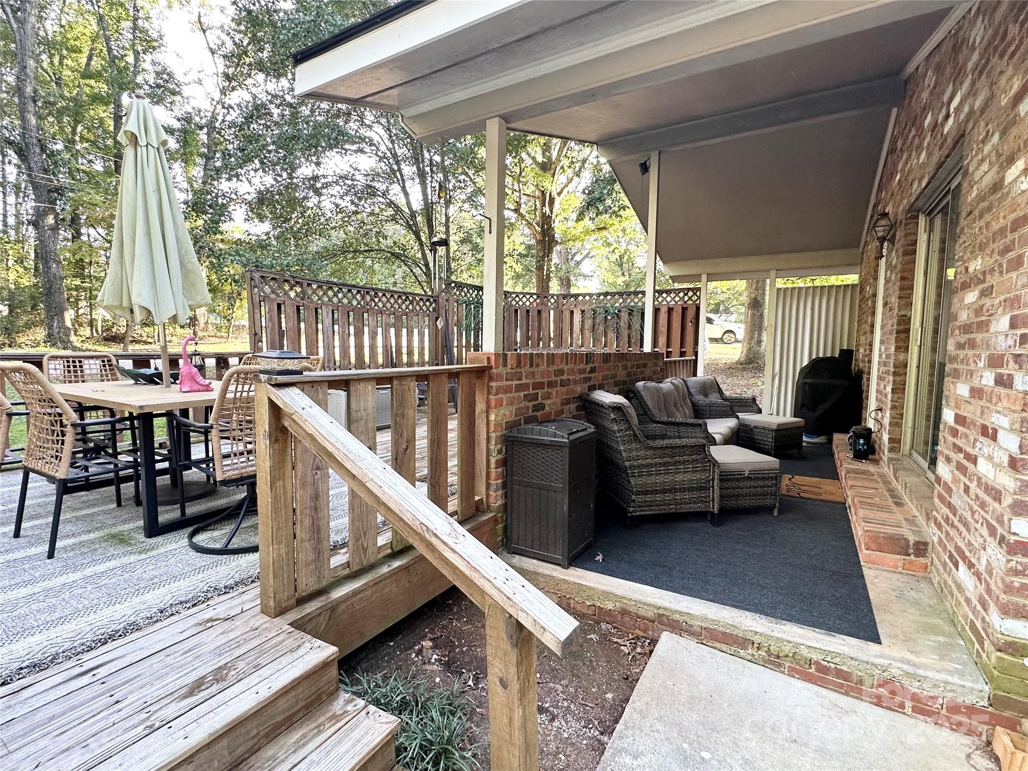 400 Charles Street Spencer, NC 28159 - Photo 25 of 26 a balcony with furniture and view of potted plants