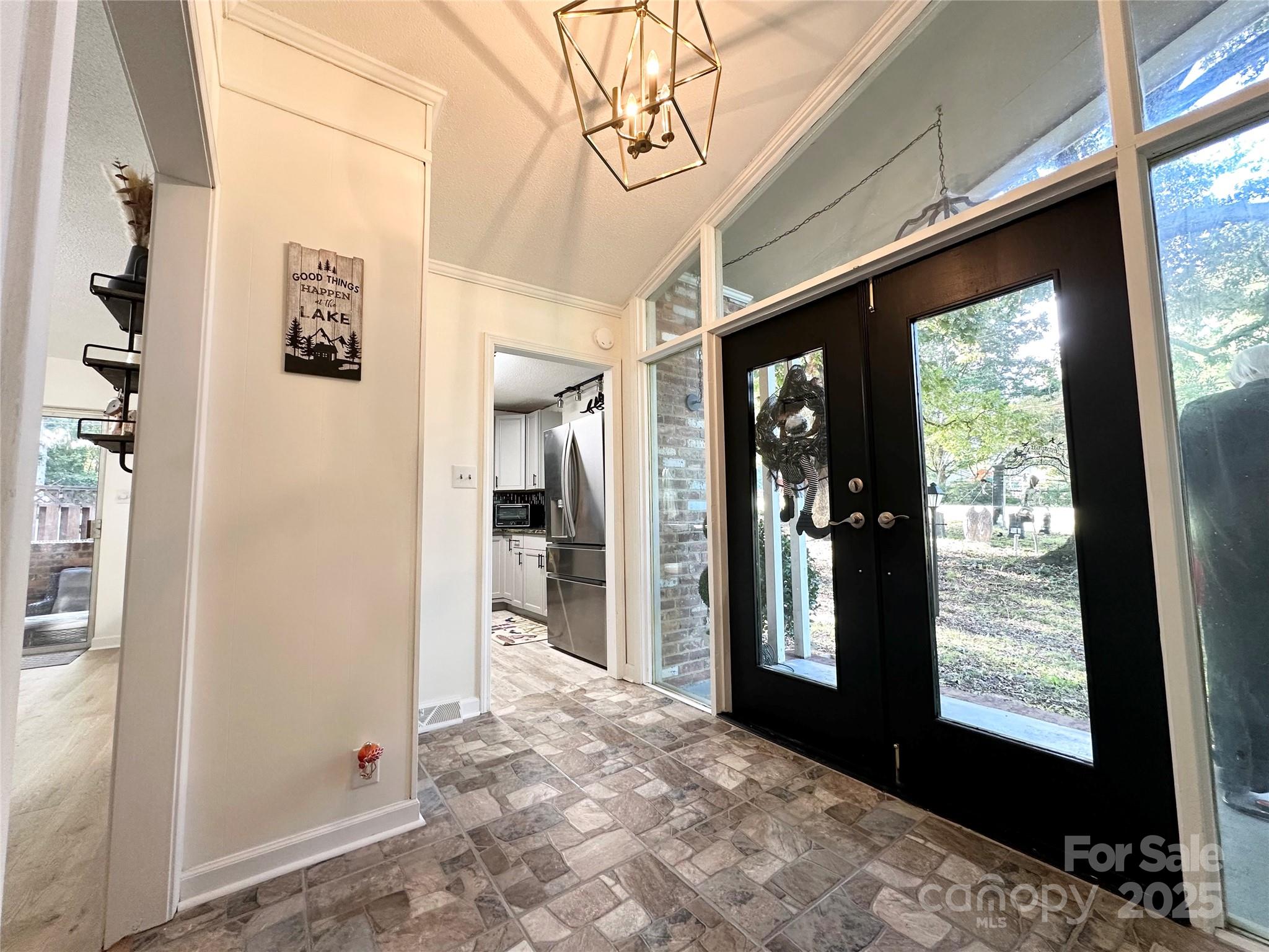 400 Charles Street Spencer, NC 28159 - Photo 4 of 26 a view of a hallway with windows and natural light