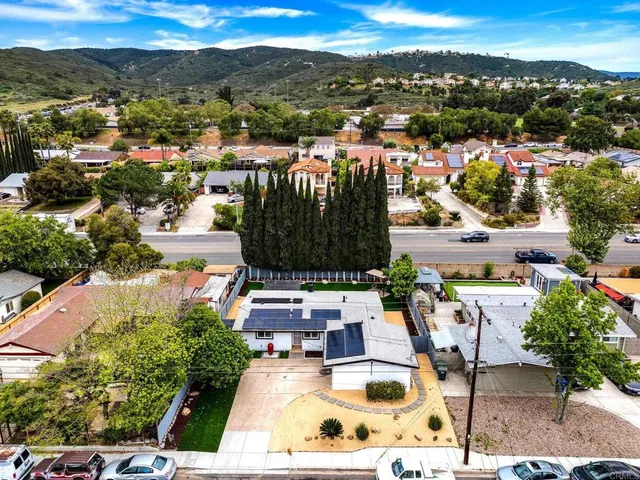 aerial view of a house with a garden