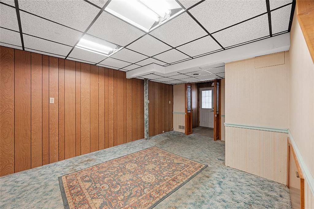 515 Braddock Road Pittsburgh, PA 15221 - Photo 28 of 38 a view of a big room with closet and windows