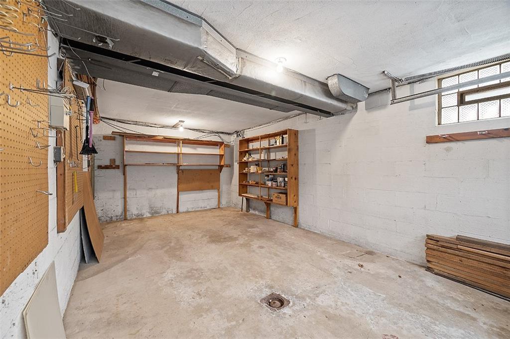515 Braddock Road Pittsburgh, PA 15221 - Photo 32 of 38 a view of an empty room with a garage