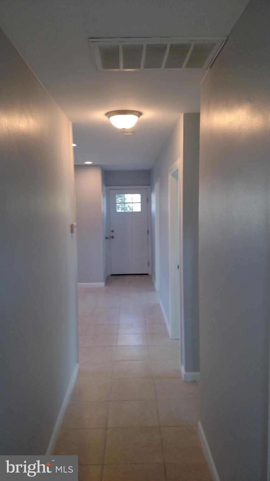 5342 Bucktown Road Cambridge, MD 21613 - Photo 7 of 33 Central hall to back