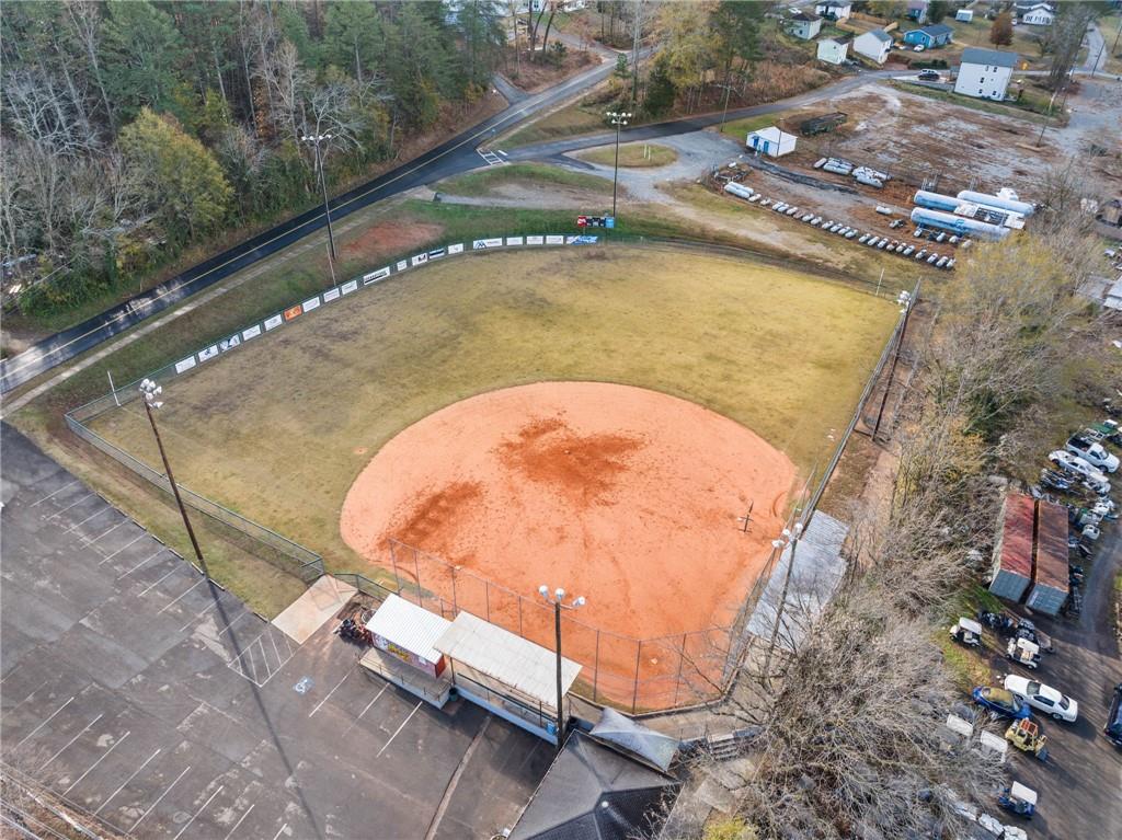 518 Old Canton Road Ball Ground, GA 30107 - Photo 36 of 42 a view of a swimming pool with a yard