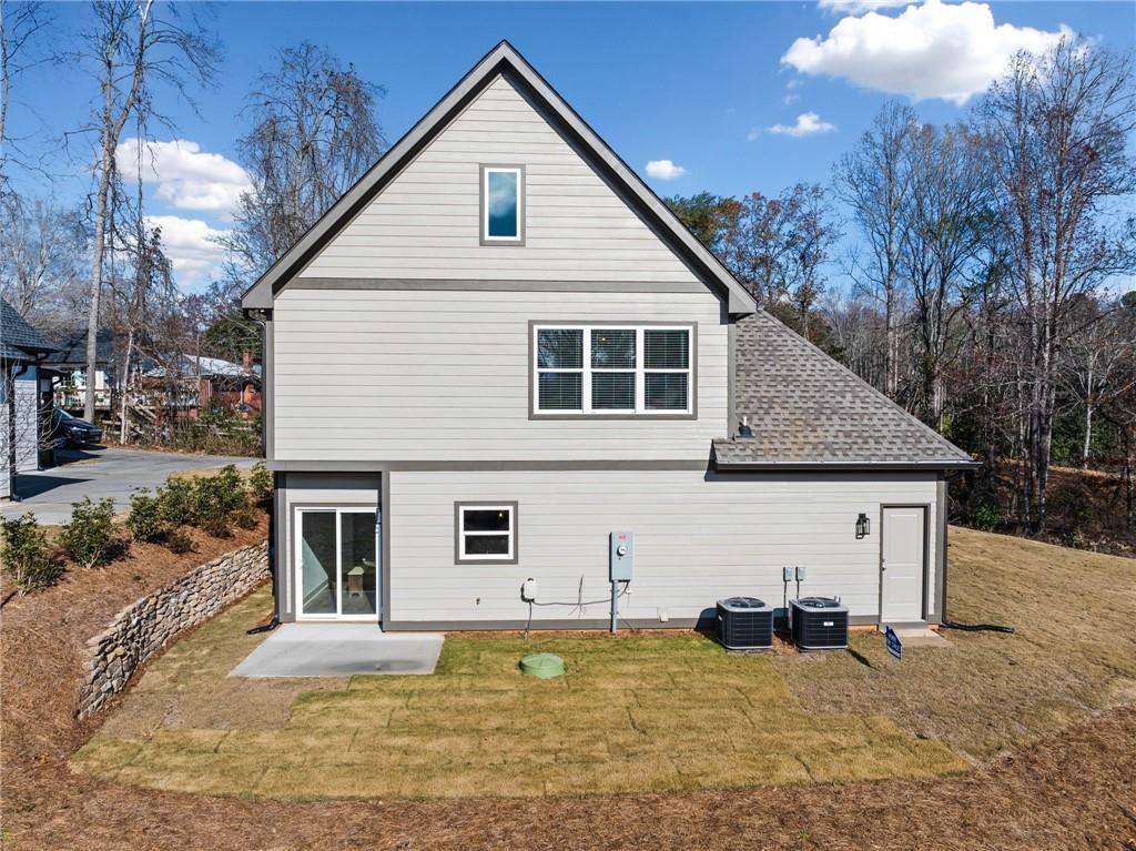 518 Old Canton Road Ball Ground, GA 30107 - Photo 5 of 42 a view of a house with backyard