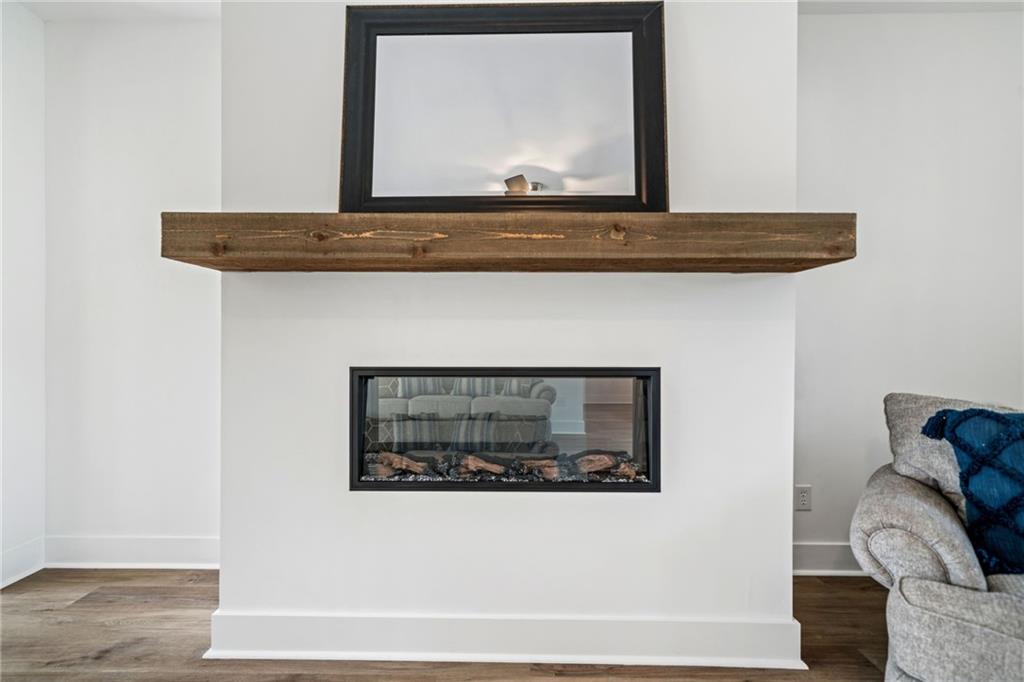 518 Old Canton Road Ball Ground, GA 30107 - Photo 7 of 42 a view of fireplace with a hallway