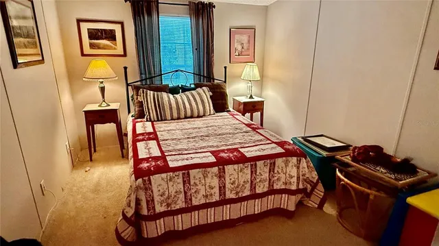 a picture of a room with furniture and wooden floor