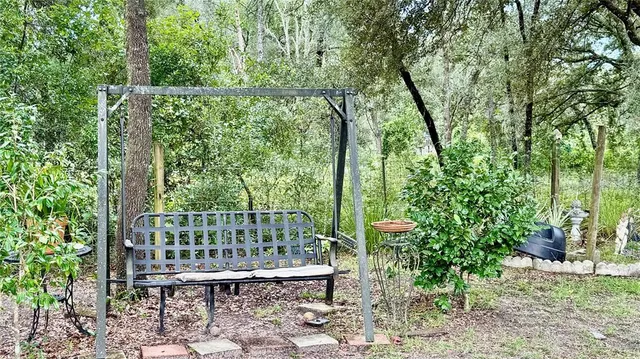 a fire hydrant in the middle of a field