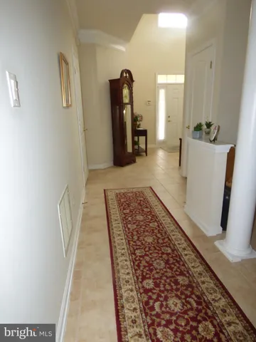 a view of an entryway with livingroom