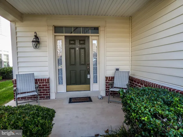 a front view of a house with a garage