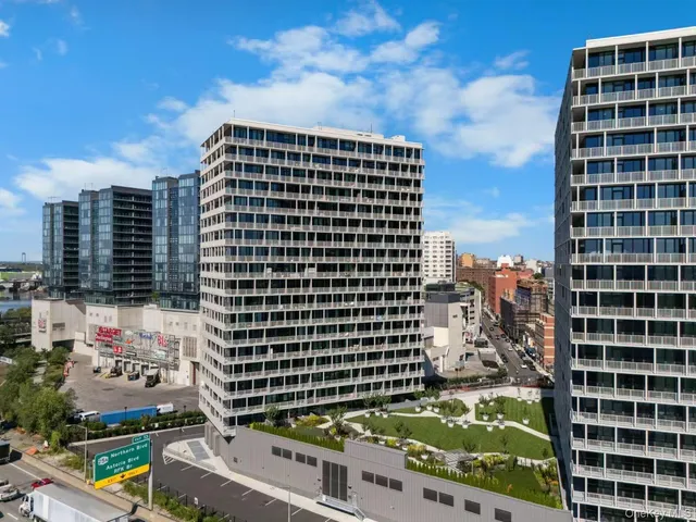 a view of a city with tall buildings