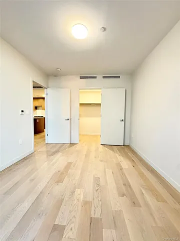an empty room with a natural light