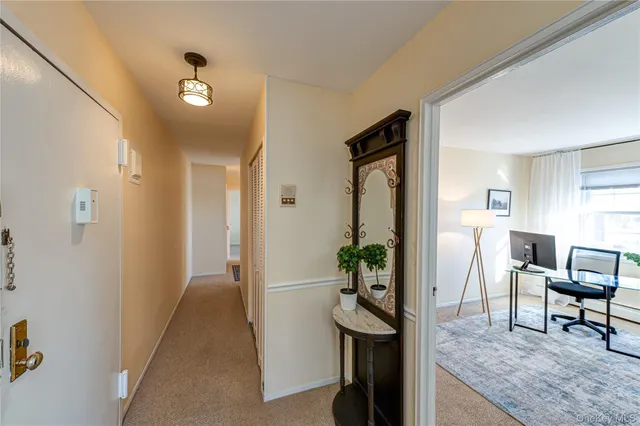 a view of a livingroom and dining room