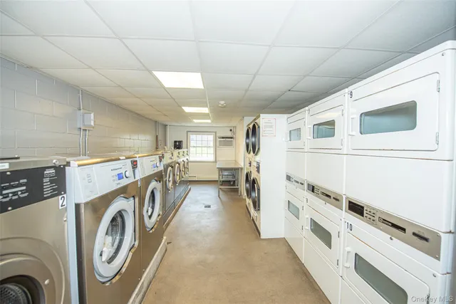 a view of a storage & utility room with stainless steel appliances