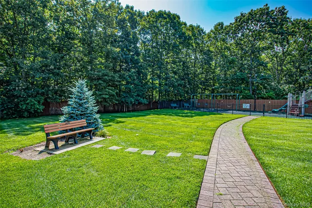 a view of a park with large trees