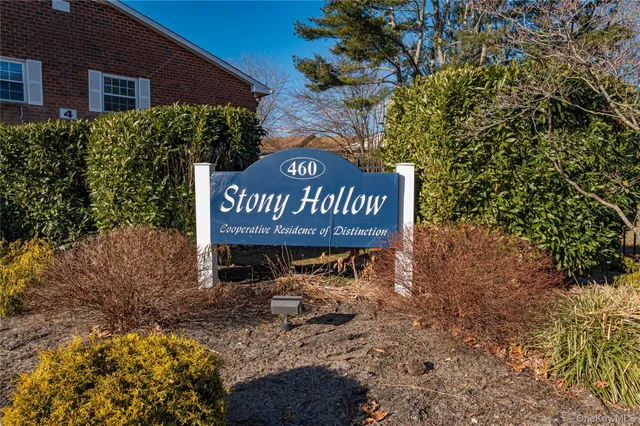 a sign broad in front of a building