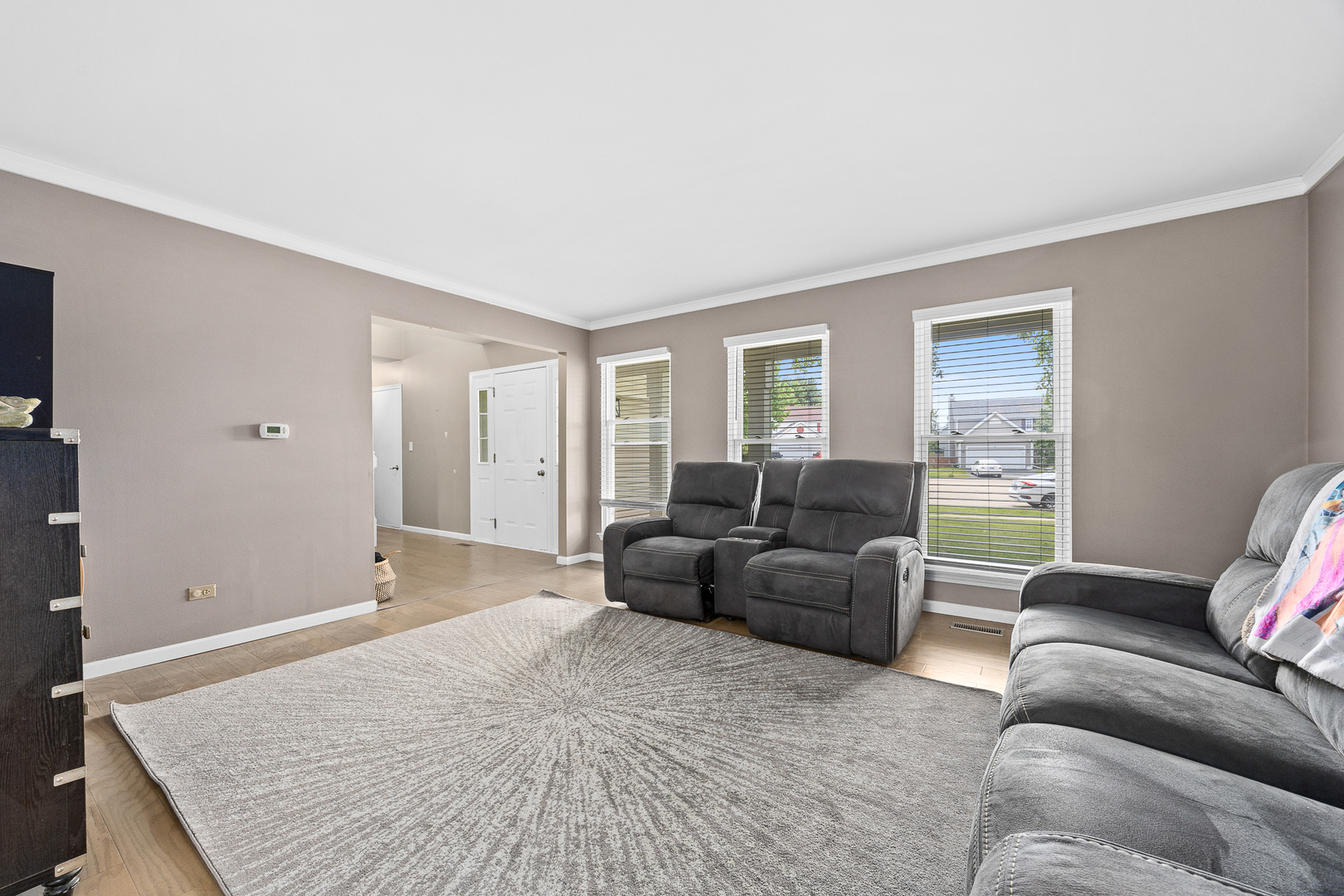 2 Buckboard Court Bolingbrook, IL 60490 - Photo 10 of 33 a living room with furniture and a window