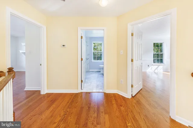 a kitchen with stainless steel appliances granite countertop a refrigerator a sink a stove a microwave and island