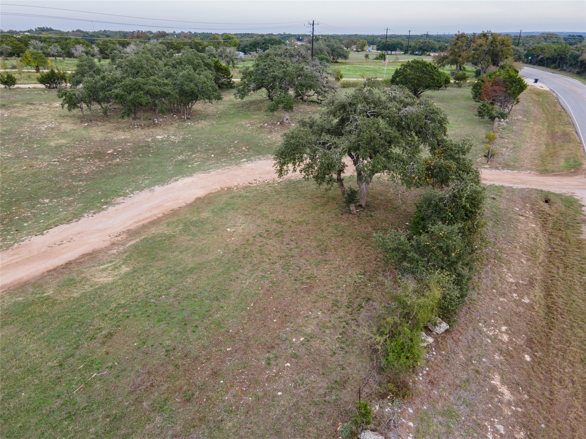 3 Ranch Road 1869 Liberty Hill, TX 78642 - Photo 12 of 15 a view of a lake with beach and outdoor space
