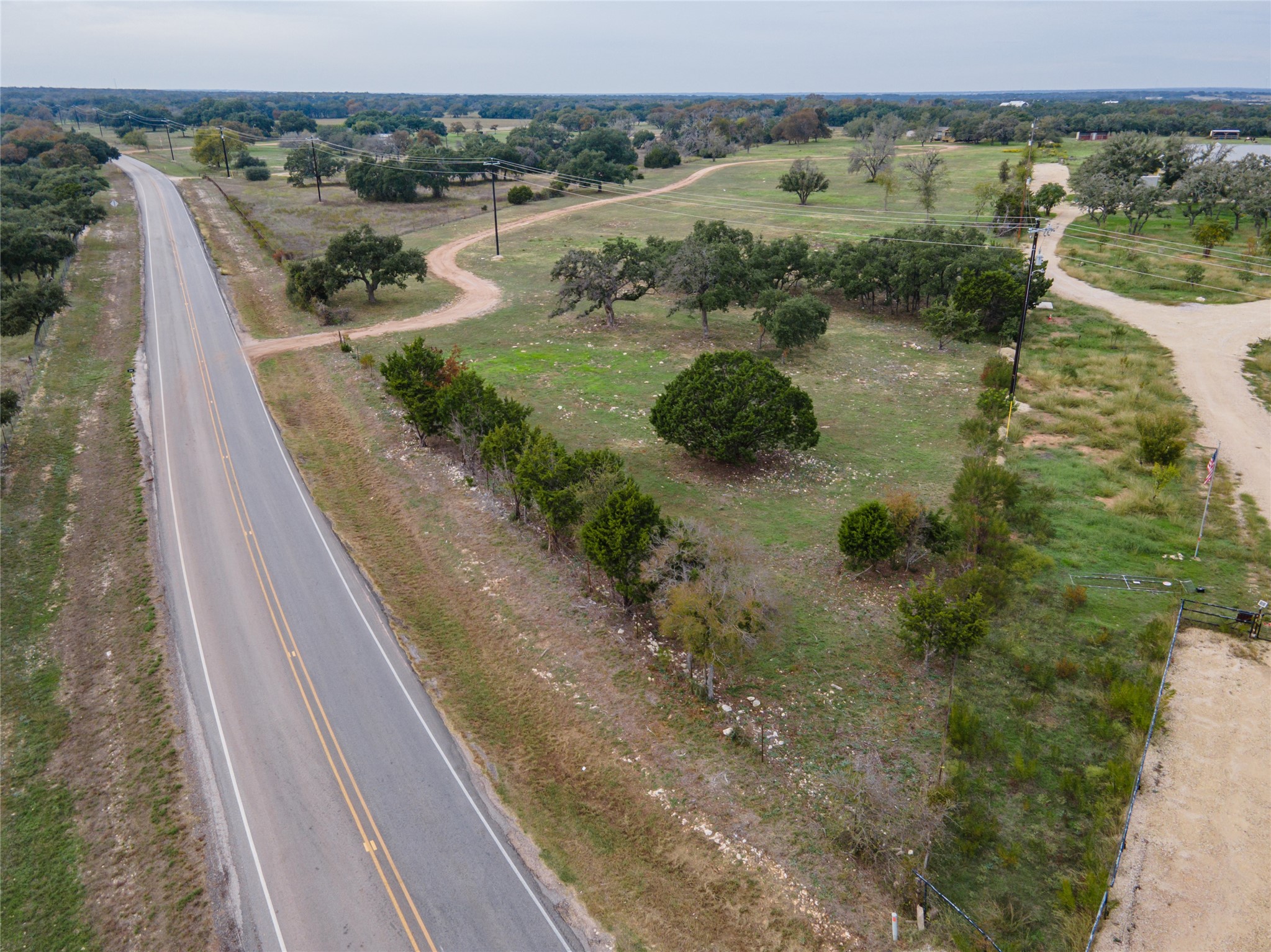 3 Ranch Road 1869 Liberty Hill, TX 78642 - Photo 14 of 15 a view of a lake with a mountain