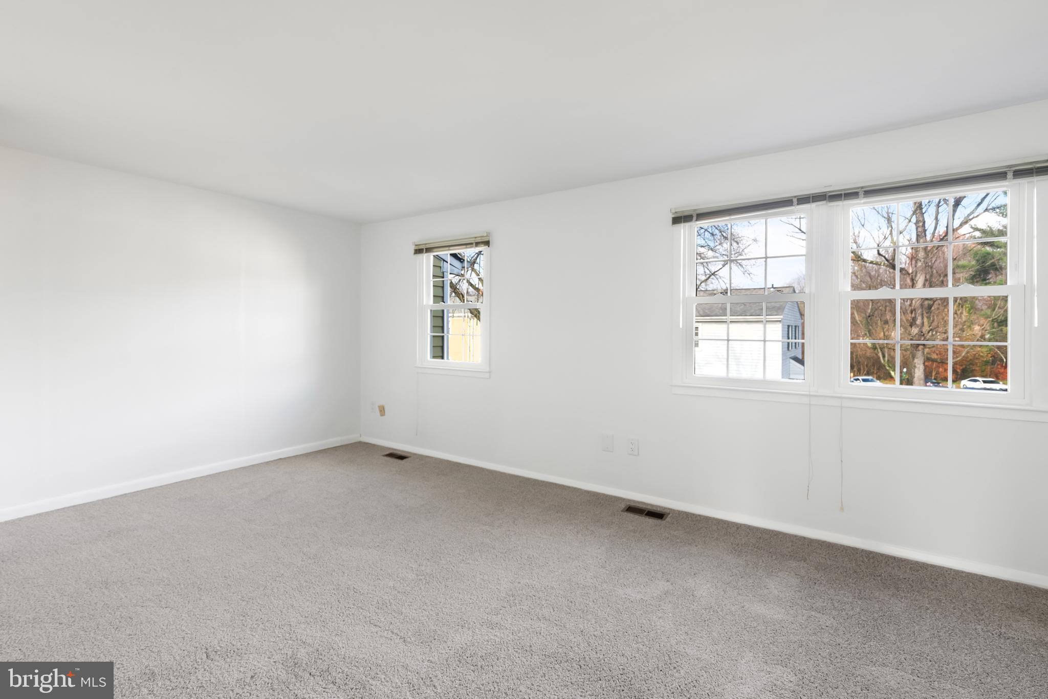 1851 Sharwood Place Crofton, MD 21114 - Photo 13 of 27 an empty room with windows