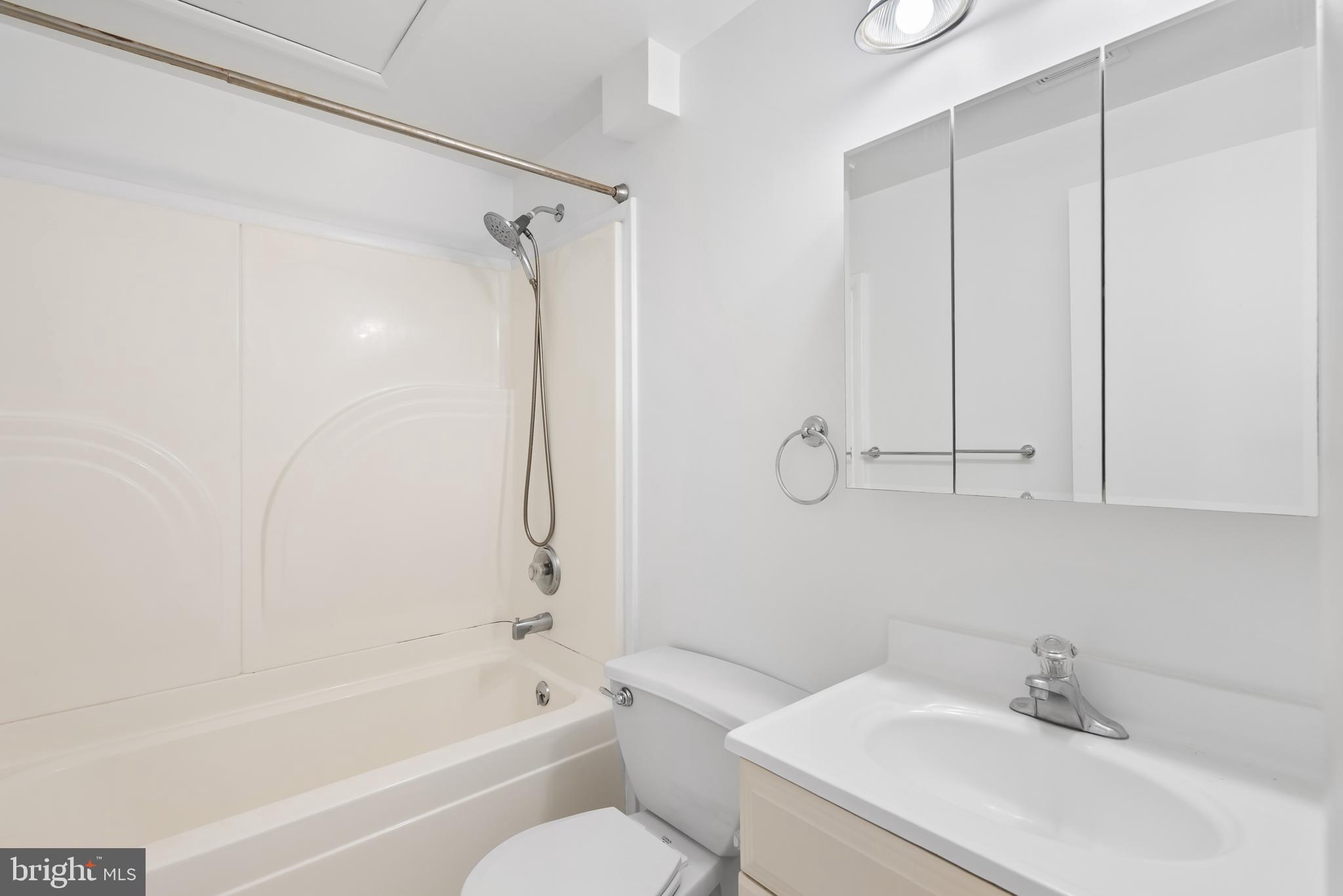 1851 Sharwood Place Crofton, MD 21114 - Photo 19 of 27 a bathroom with a sink toilet and shower