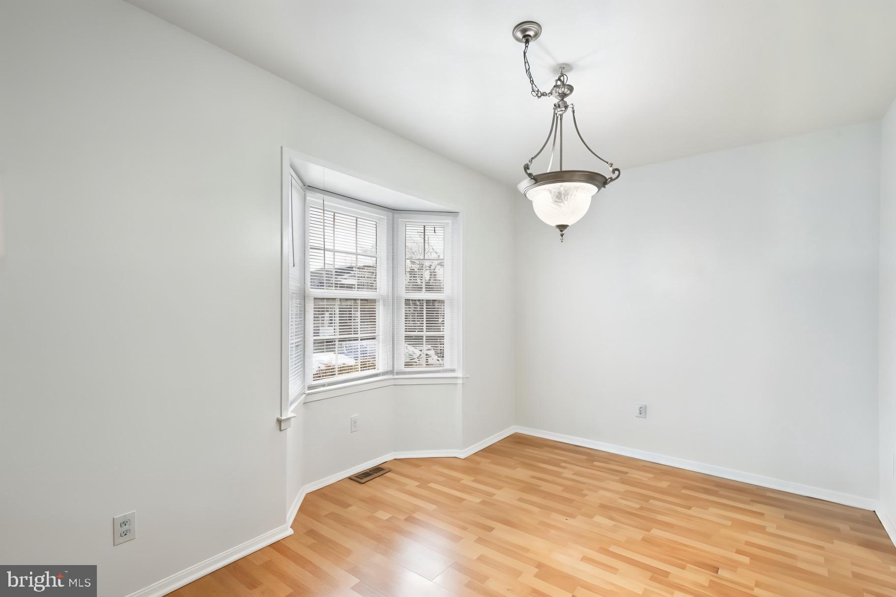 1851 Sharwood Place Crofton, MD 21114 - Photo 9 of 27 a bedroom with a bed and a window