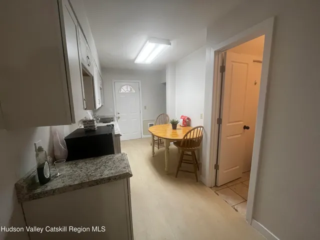 a very nice looking dining room with a table and chairs