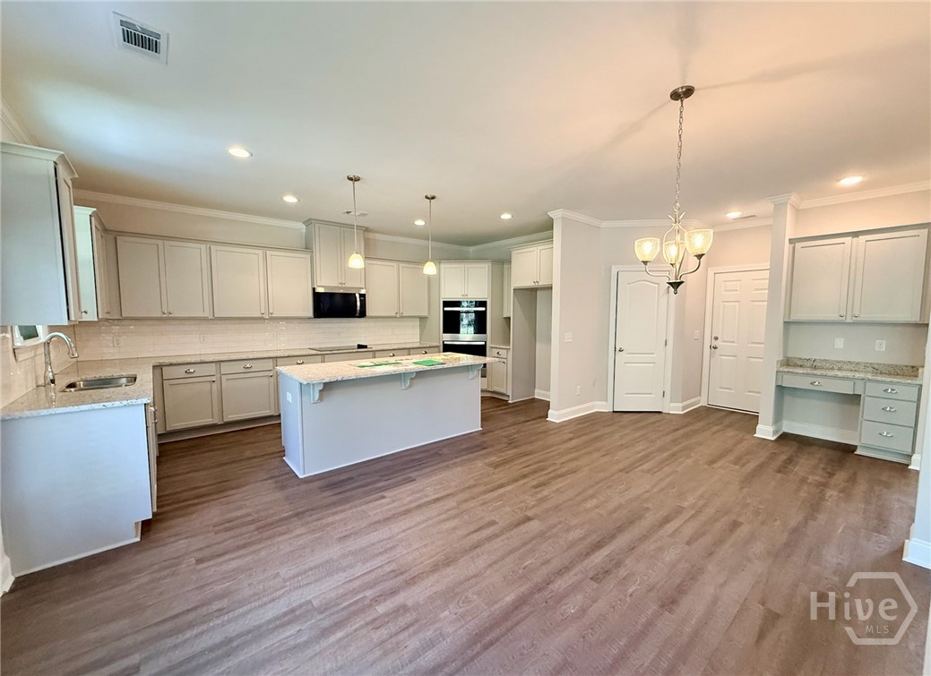 117 Concord Drive Guyton, GA 31312 - Photo 12 of 28 Kitchen/Breakfast Area/Writing Station