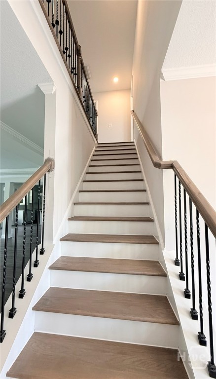 117 Concord Drive Guyton, GA 31312 - Photo 17 of 28 Staircase/Landing to Upper Level