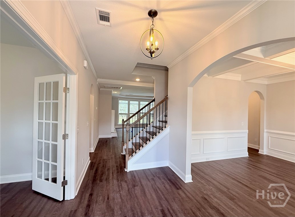 117 Concord Drive Guyton, GA 31312 - Photo 6 of 28 Front Entryway/Formal Living Room or Study/Formal Dining Room/Hallway