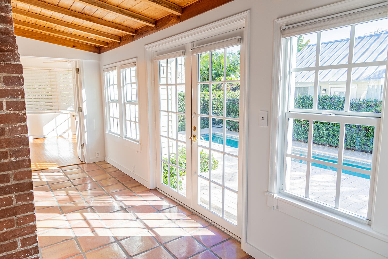 232 Marlborough Road West Palm Beach, FL 33405 - Photo 9 of 37 Sunroom looking out toward pool area