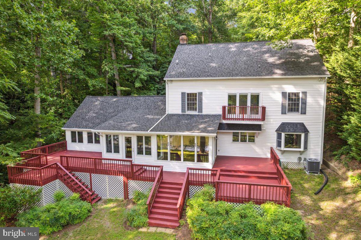 640 Willow Road Lusby, MD 20657 - Photo 2 of 67 Expansive outdoor living with multiple zones!
