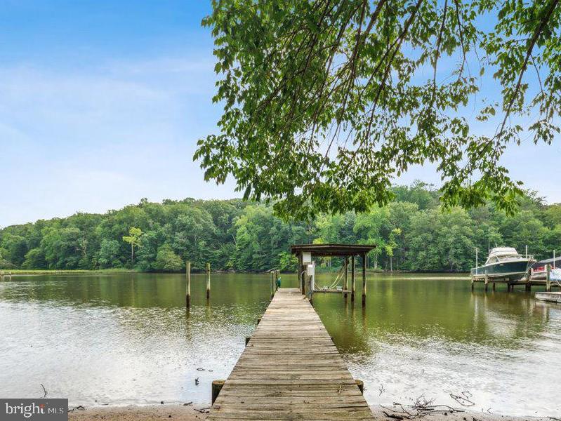 640 Willow Road Lusby, MD 20657 - Photo 26 of 67 Private pier with covered slip & 2 lifts.