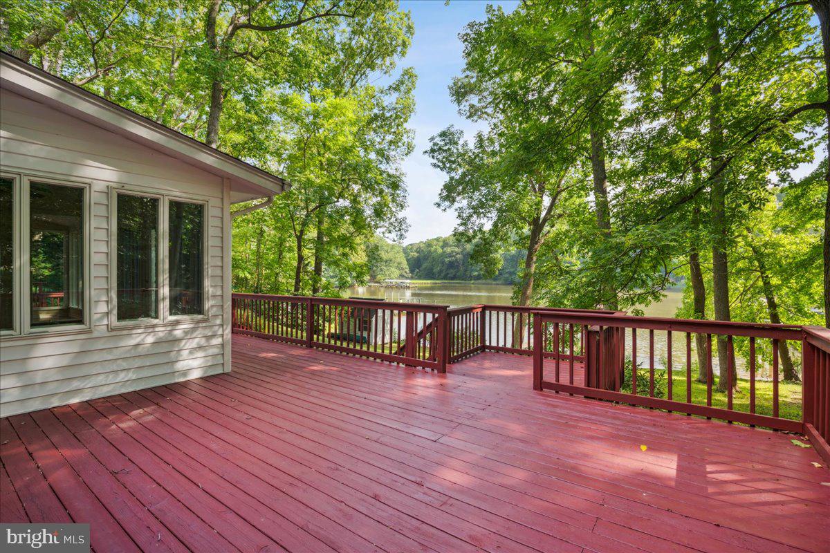 640 Willow Road Lusby, MD 20657 - Photo 31 of 67 Right side of the large deck space.