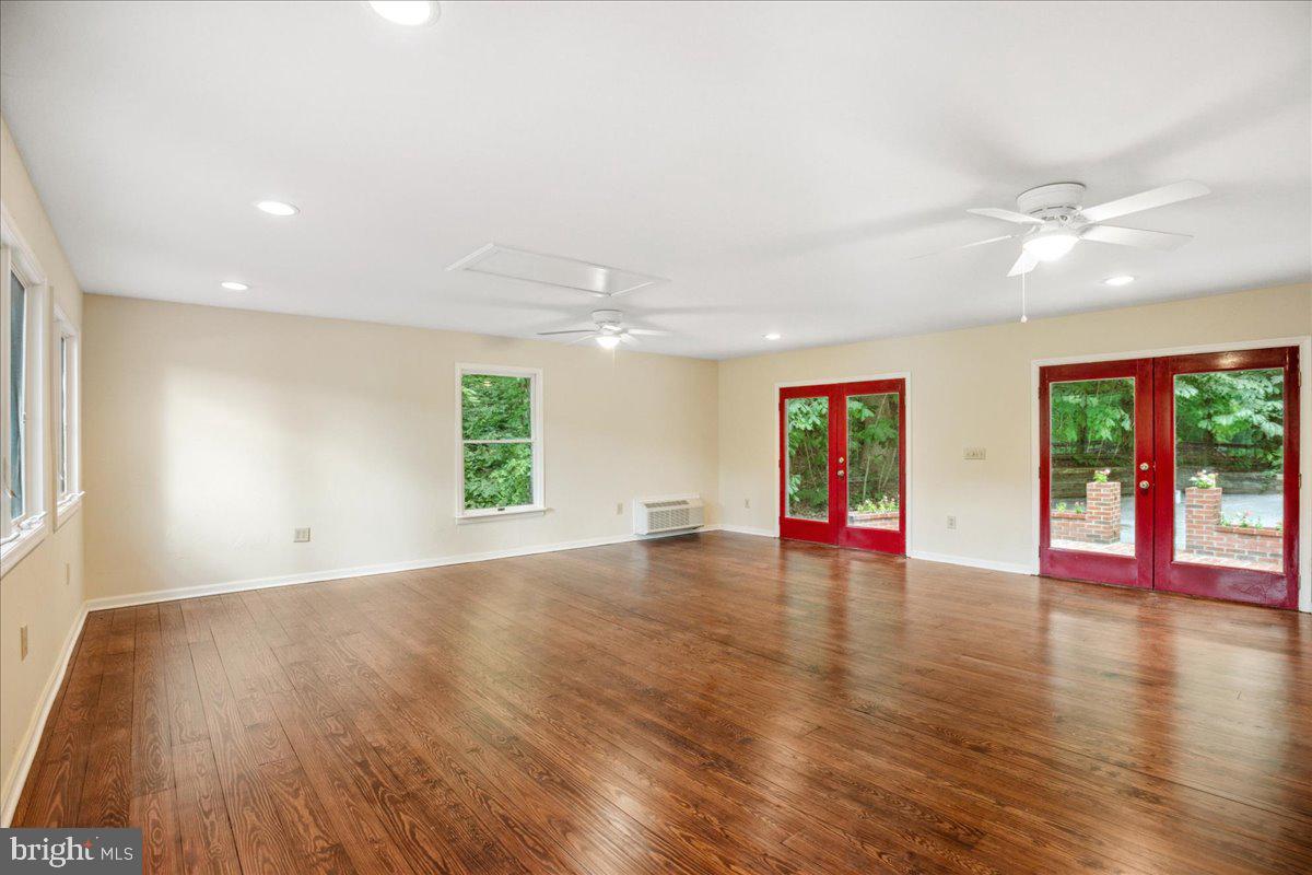 640 Willow Road Lusby, MD 20657 - Photo 35 of 67 Huge additional living room, access to patio.