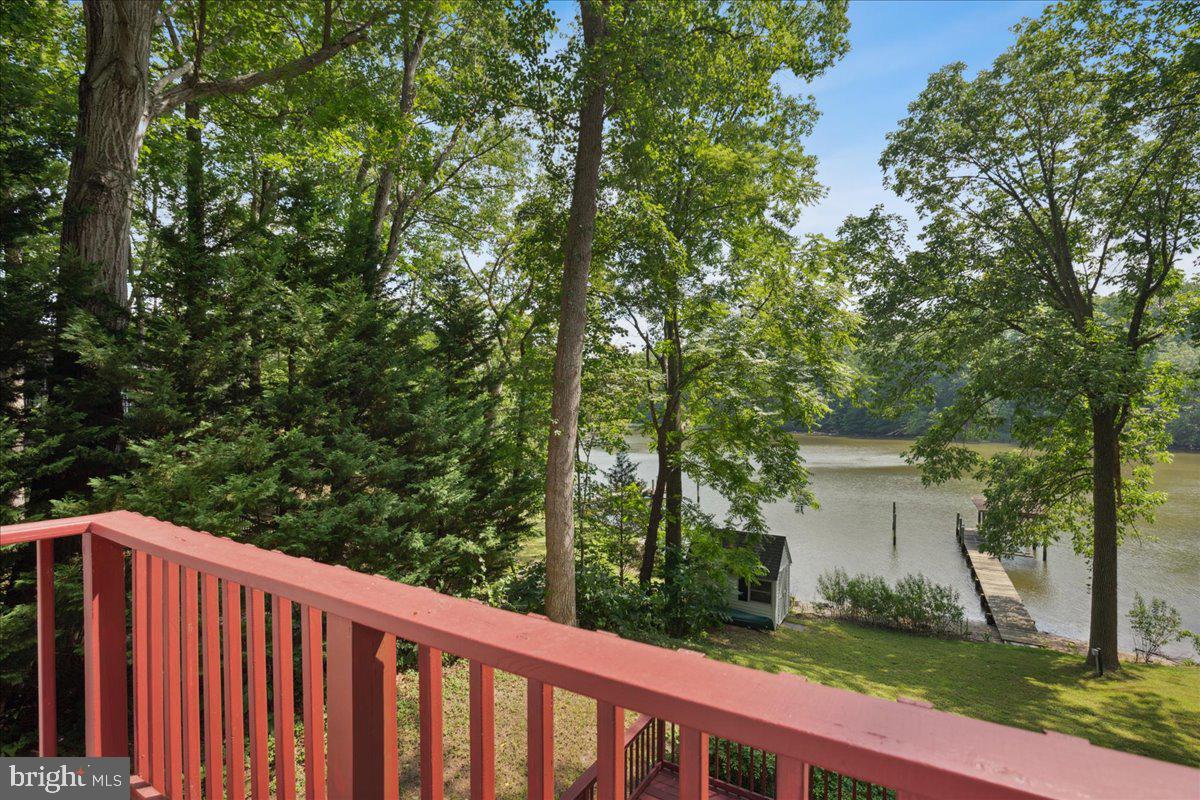 640 Willow Road Lusby, MD 20657 - Photo 53 of 67 Primary suite balcony overlooking the creek.