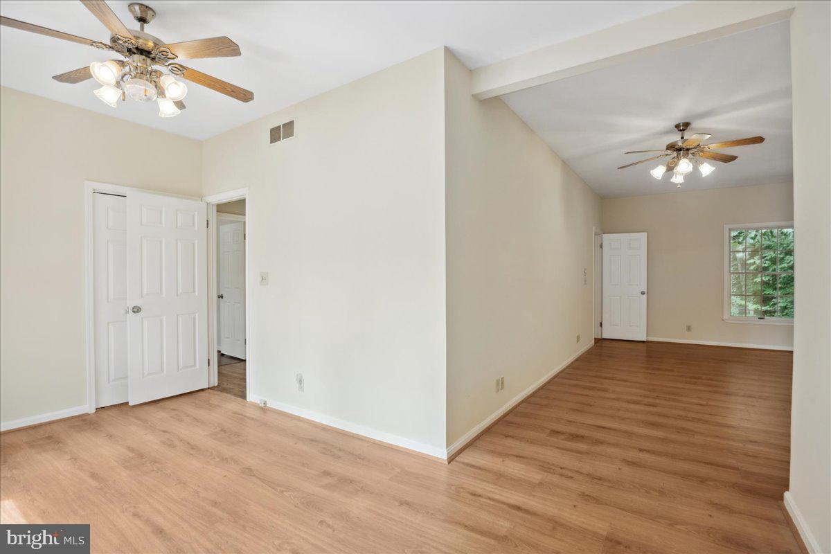 640 Willow Road Lusby, MD 20657 - Photo 54 of 67 Primary Bedroom looking through to hall bath.