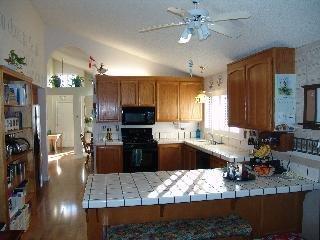 7489 Maximillian Place Rohnert Park, CA 94928 - Photo 4 of 6 a kitchen with refrigerator and cabinets