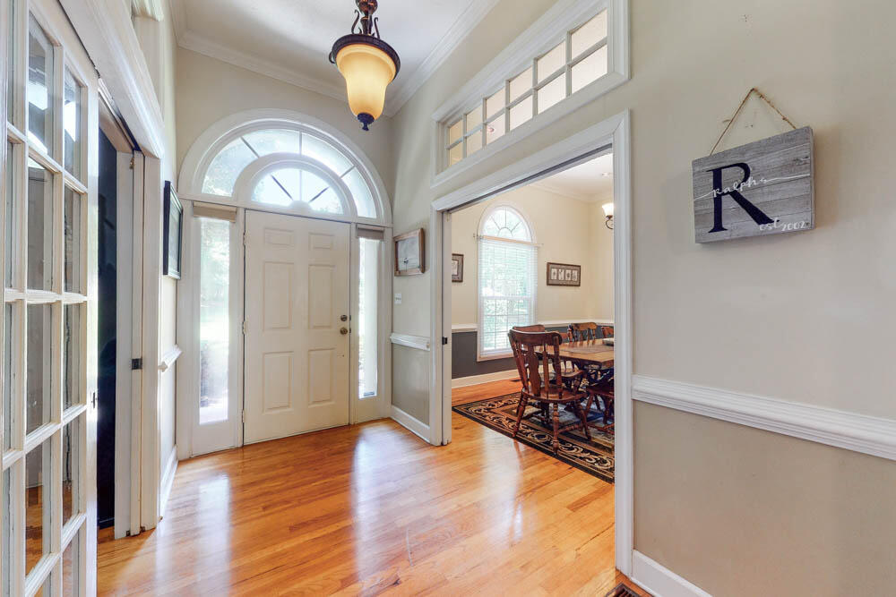 49 Roper Court North Augusta, SC 29860 - Photo 9 of 42 High ceilings, crown molding & hardwood floors starting in the foyer and continue through the main living areas!