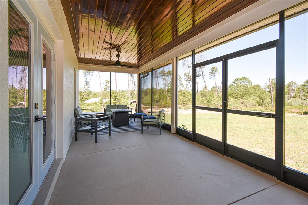 7890 Southwest 129th Avenue Cedar Key, FL 32625 - Photo 31 of 45 a very nice looking room with a large window and furniture
