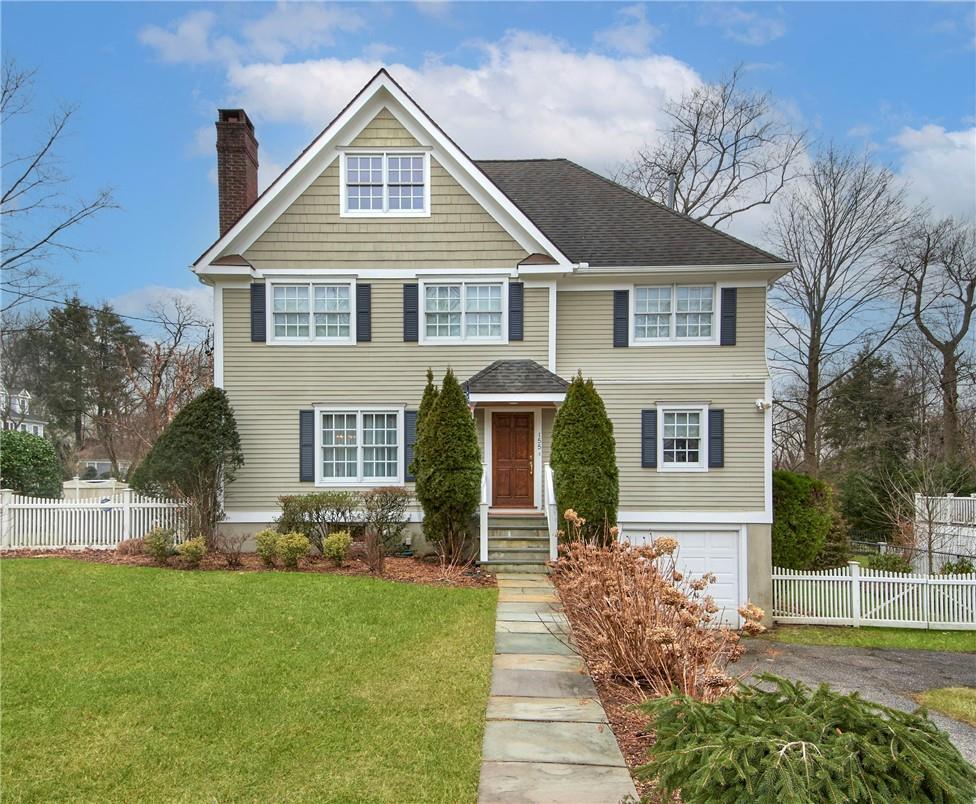 155 Osborn Road Rye, NY 10580 - Photo 1 of 1 a front view of a house with garden