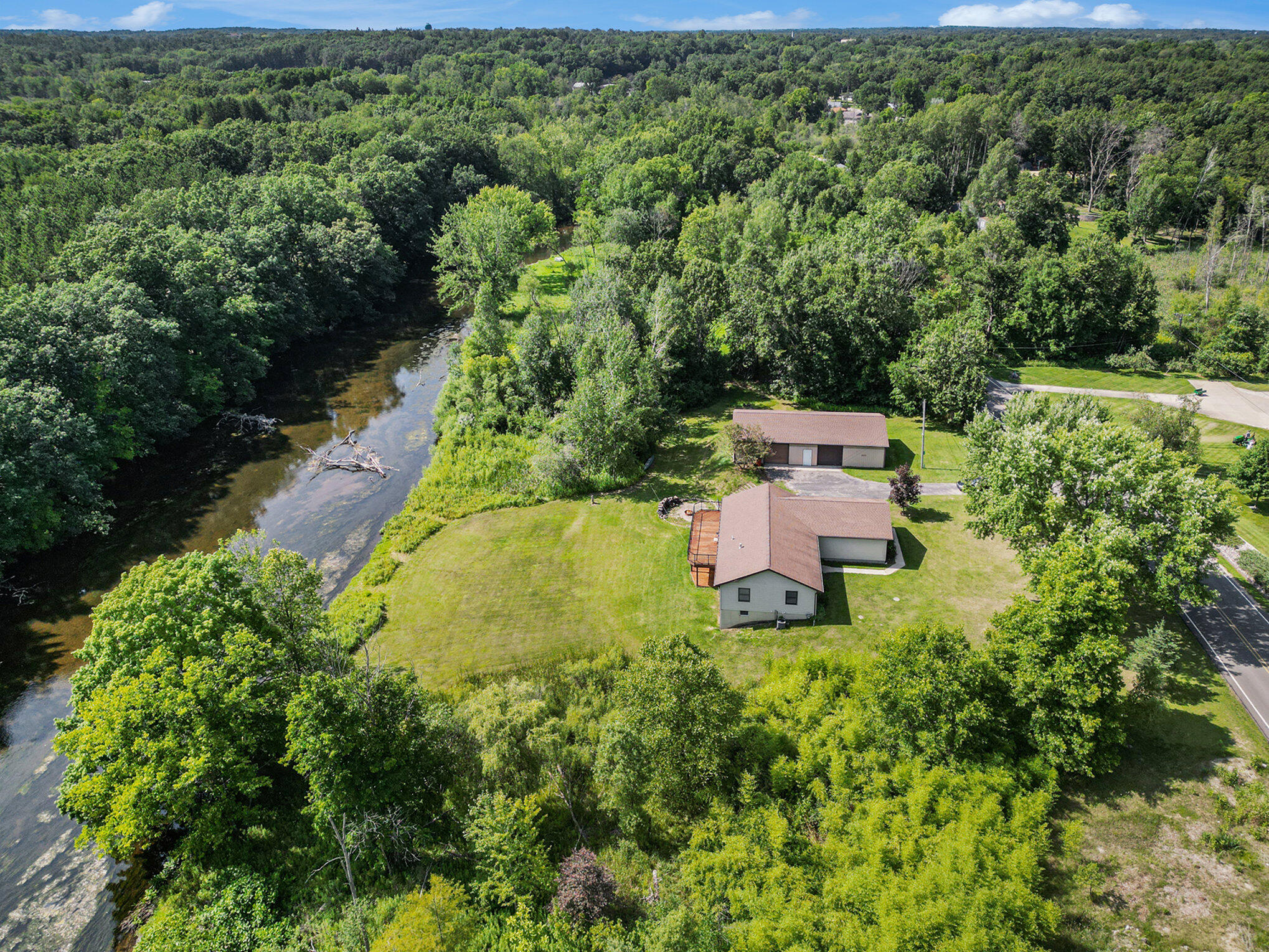 9060 River Road Greenville, MI 48838 - Photo 1 of 37 aerial with river
