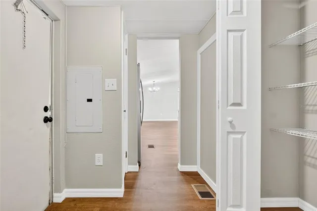 a view of a bathroom with a glass door and a shower
