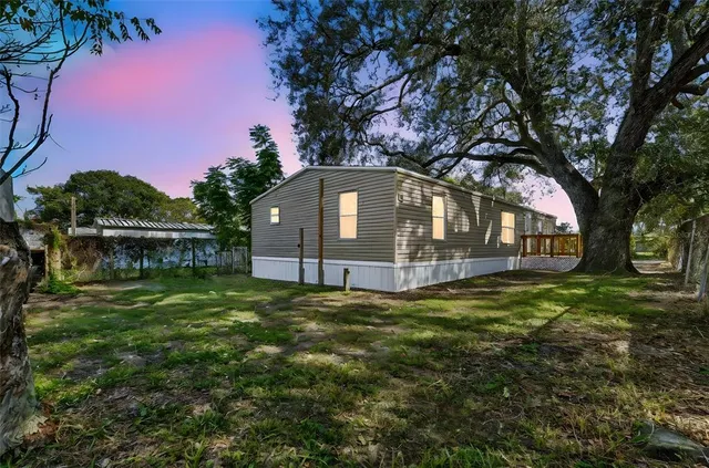 a view of outdoor space with deck and patio
