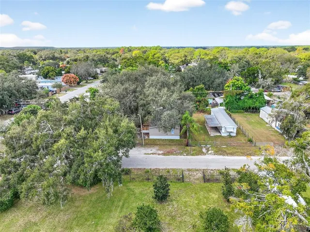 a view of a house with a park