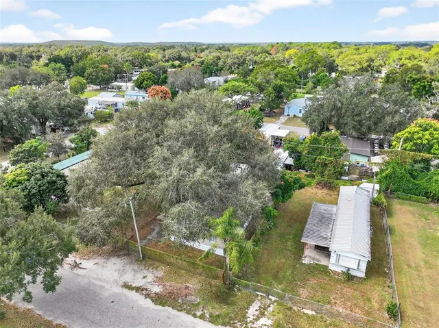 a view of swimming pool with a yard