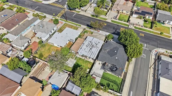 an aerial view of a house with a garden
